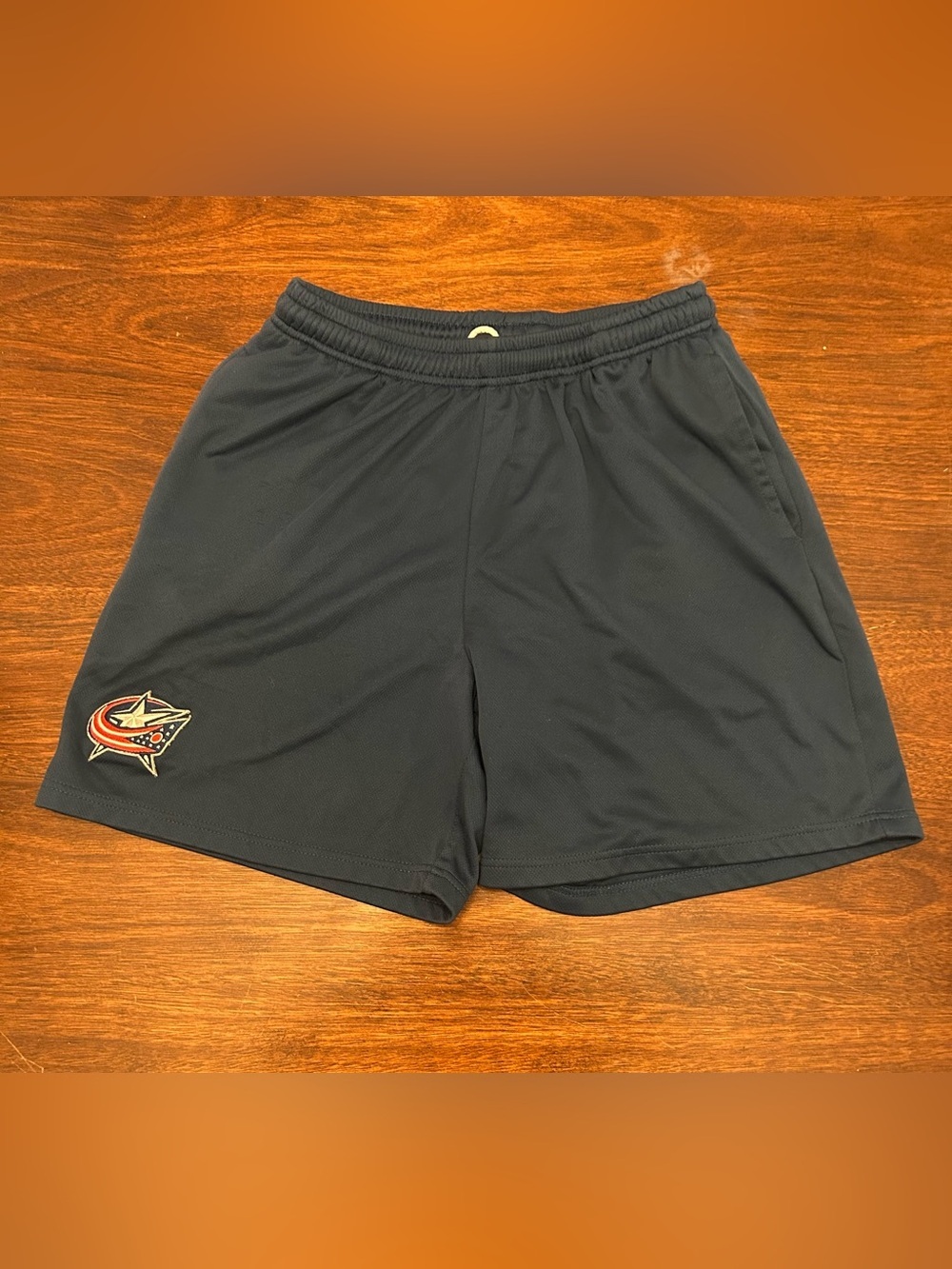 NHL Black Performance Shorts with Team Crest